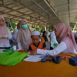 Siswa MTsN 5 Balangan mengikuti Program Aksi Bergizi yang digelar Dinas Kesehatan Kabupaten Balangan.