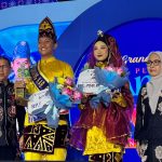 Nanang dan Galuh Banjar 2026 menerima selempang pada malam grand final di Banjarbaru.